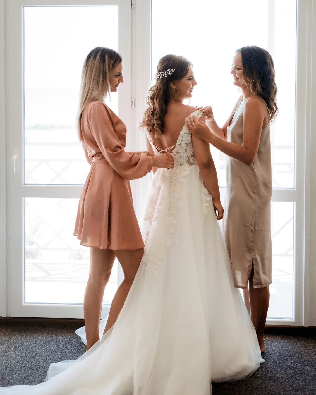 Bride in a bright suite for bridal spray tan planning inspiration